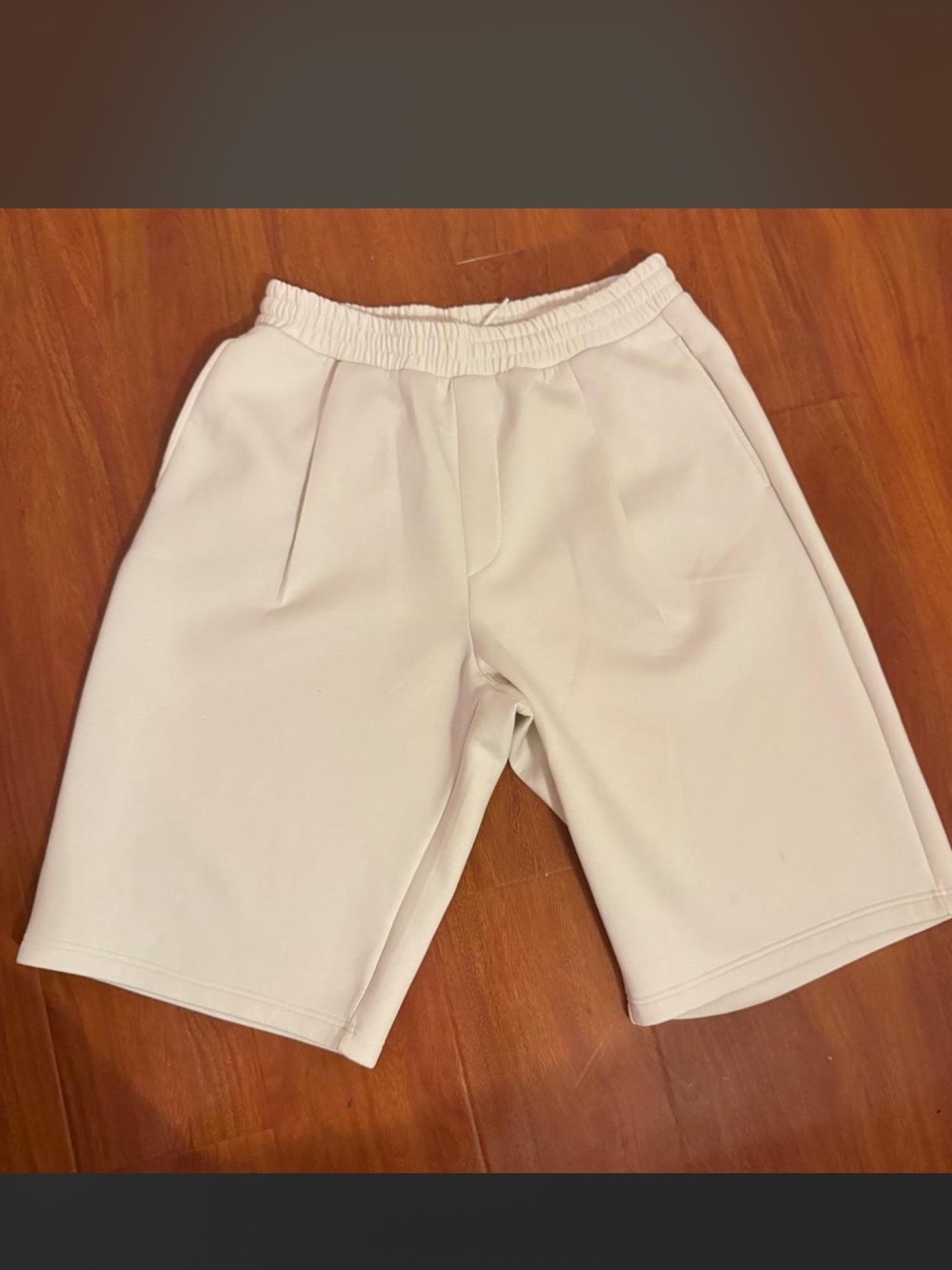 Unisex cream/white GU shorts size XL